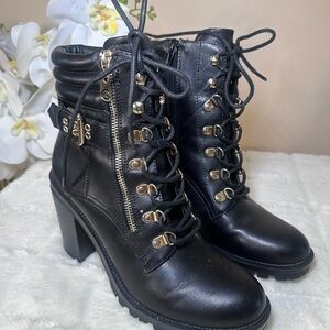 Elegant Black Lace-Up Boots with Gold Accents